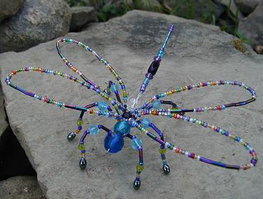 Beaded dragonfly on stone